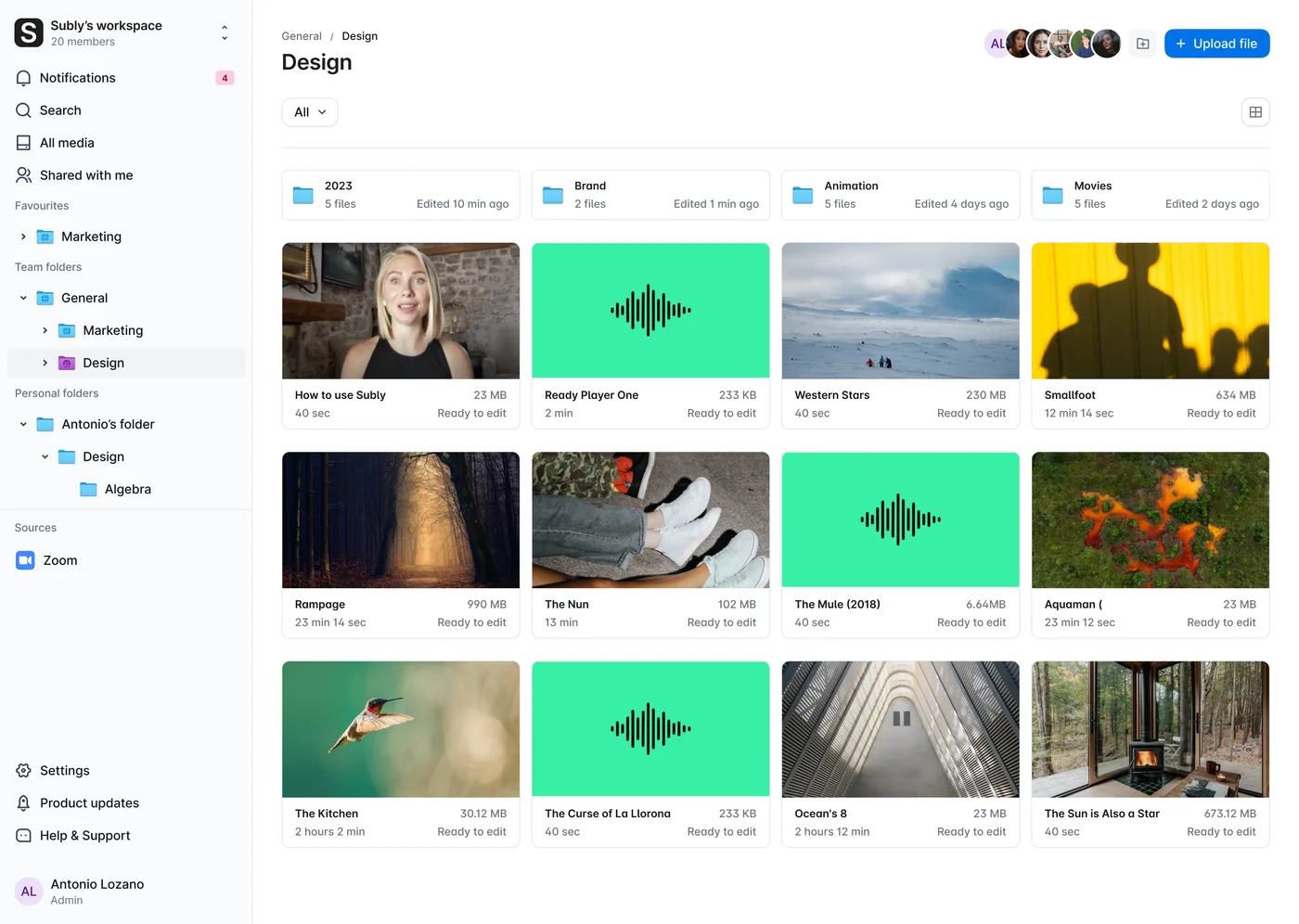 The Subly workspace with team folders in the sidebar and a department folder of media open.